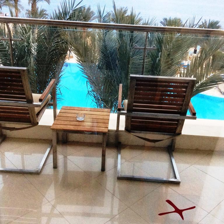 Xperience Sea Breeze Resort Sharm el-Sheikh Exterior foto A balcony at the hotel
