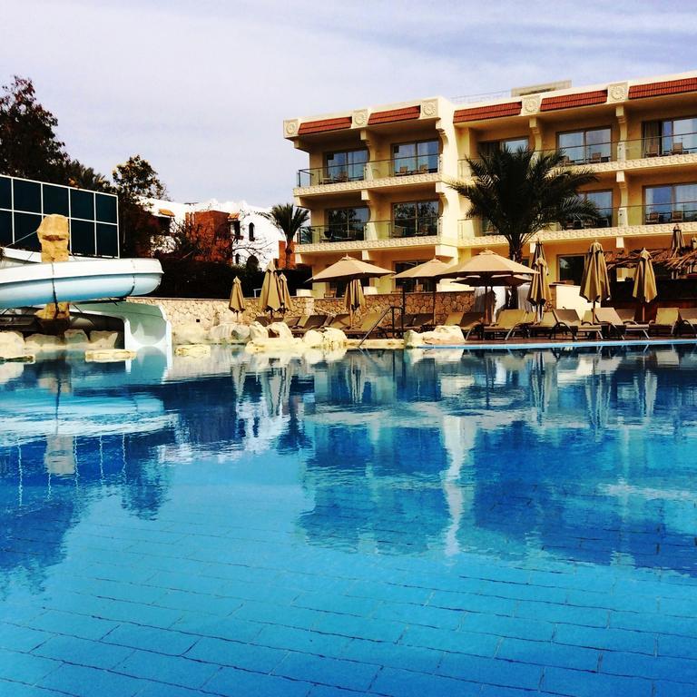 Xperience Sea Breeze Resort Sharm el-Sheikh Exterior foto The pool at the hotel