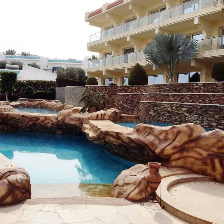 Xperience Sea Breeze Resort Sharm el-Sheikh Exterior foto The pool at the Mirage