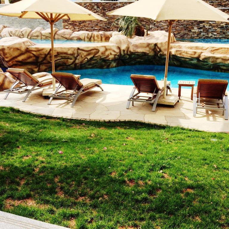 Xperience Sea Breeze Resort Sharm el-Sheikh Exterior foto The pool at the hotel