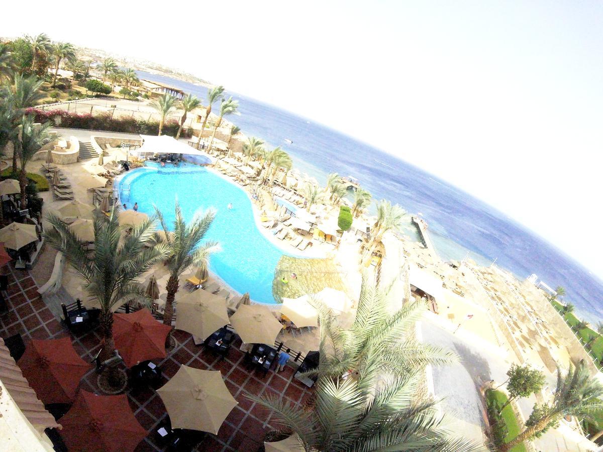 Xperience Sea Breeze Resort Sharm el-Sheikh Exterior foto View of the pool at the Hilton Sharm El Sheikh