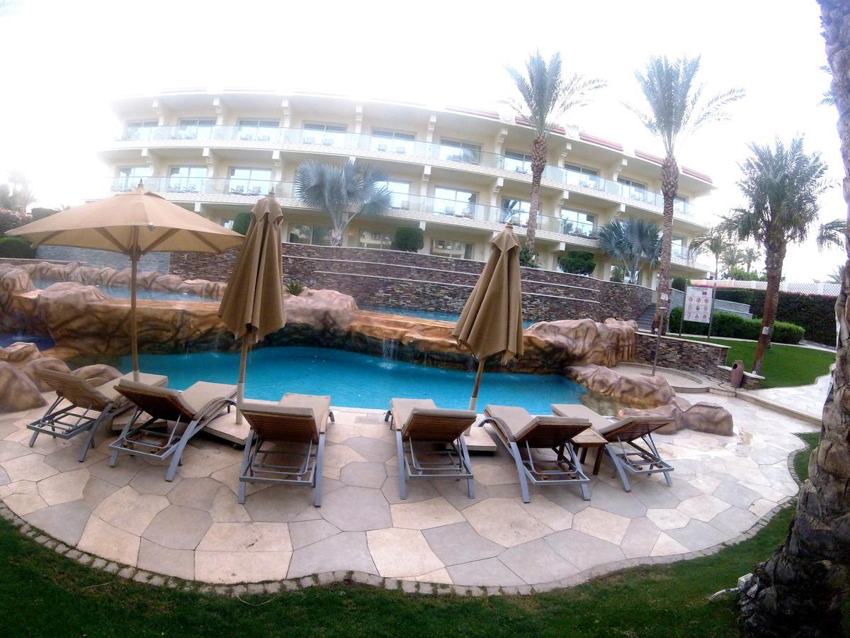 Xperience Sea Breeze Resort Sharm el-Sheikh Exterior foto The pool at the St Regis