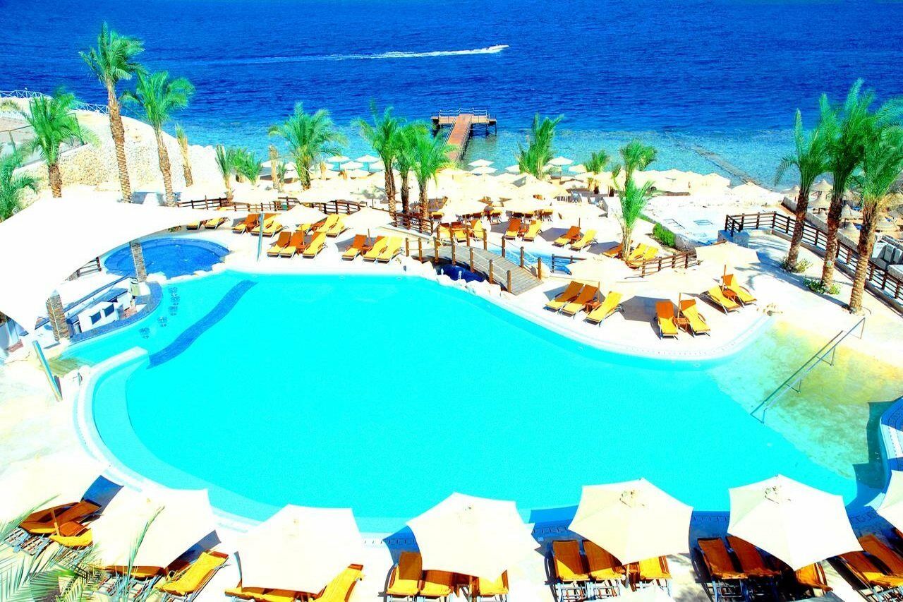 Xperience Sea Breeze Resort Sharm el-Sheikh Exterior foto The pool at the beach club