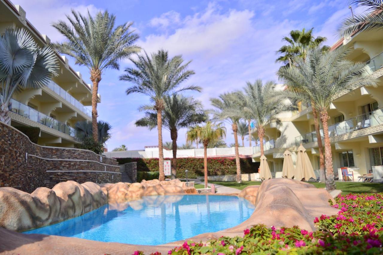 Xperience Sea Breeze Resort Sharm el-Sheikh Exterior foto The pool at the Renaissance Palm Hotel