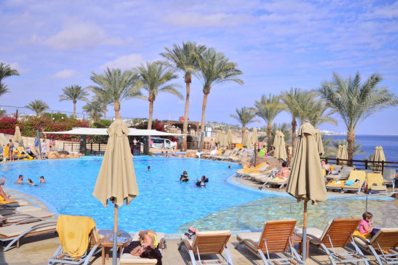 Xperience Sea Breeze Resort Sharm el-Sheikh Exterior foto A pool at a resort in Sharm El Sheikh, Egypt