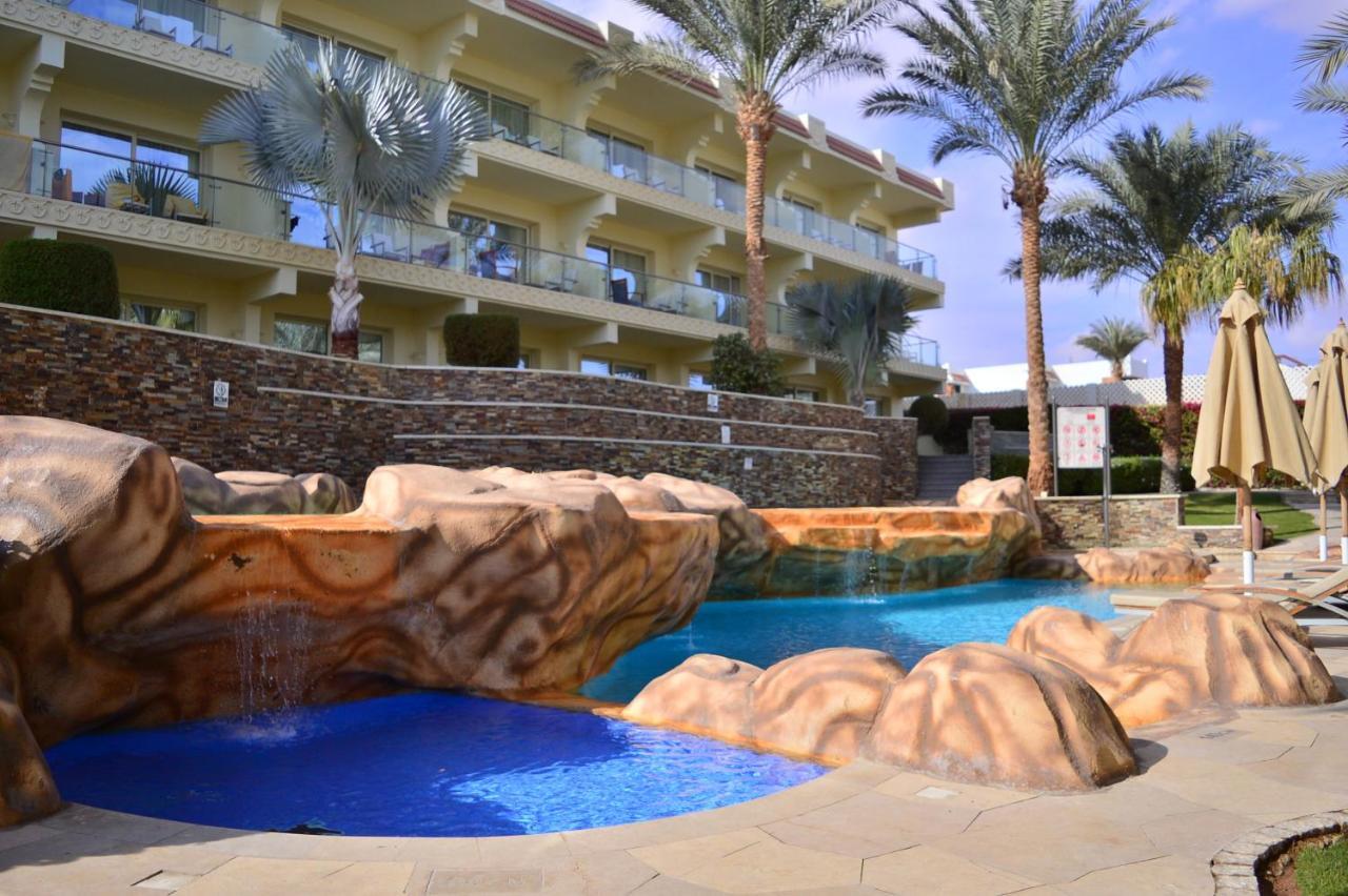 Xperience Sea Breeze Resort Sharm el-Sheikh Exterior foto The pool at the Hilton Sharm El Sheikh