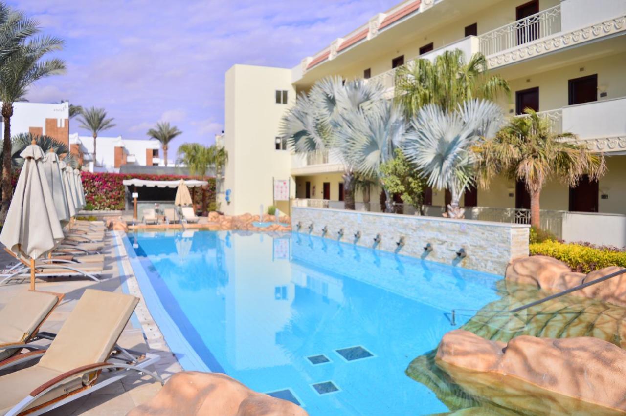 Xperience Sea Breeze Resort Sharm el-Sheikh Exterior foto A swimming pool at a hotel in Egypt